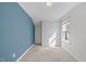 Bedroom featuring carpeted floors, a ceiling fan, and a large window at 4940 Heathshire Dr, Raleigh, NC 27616
