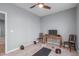 Finished basement with a desk and chair, and a variety of exercise equipment at 50 Sneed Ln, Fuquay Varina, NC 27526