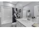 Bathroom featuring a white sink, toilet, and a shower with a floral curtain at 50 Sneed Ln, Fuquay Varina, NC 27526