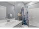 Bathroom featuring a modern sink and a shower with a decorative, colorful curtain at 50 Sneed Ln, Fuquay Varina, NC 27526