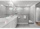 Modern bathroom with dual sinks, white cabinets, a large mirror, and walk-in shower at 50 Sneed Ln, Fuquay Varina, NC 27526