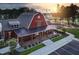 Exterior view of community amenity center with covered porch and seating at 50 Sneed Ln, Fuquay Varina, NC 27526