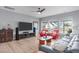 Cozy living room features stylish seating, modern entertainment center and bright windows at 50 Sneed Ln, Fuquay Varina, NC 27526