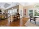 Cozy dining area with natural lighting, bar seating, and hardwood floors at 50002 Brogden, Chapel Hill, NC 27517