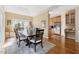 Dining room adjacent to the kitchen with hardwood floors and natural light from the windows at 50002 Brogden, Chapel Hill, NC 27517