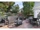 Charming brick patio with comfortable seating, perfect for outdoor entertaining at 50002 Brogden, Chapel Hill, NC 27517