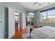 Comfortable bedroom with city views, and ensuite access to balcony at 506 N Mangum St # 303, Durham, NC 27701