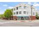 Inviting building exterior with modern design, showcasing large windows and entrance at 506 N Mangum St # 303, Durham, NC 27701