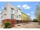 Stylish building exterior with modern design and a landscaped walkway at 506 N Mangum St # 303, Durham, NC 27701