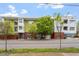 Attractive building exterior featuring modern architecture and well-maintained landscaping at 506 N Mangum St # 303, Durham, NC 27701