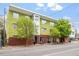 Charming building exterior with well-maintained landscaping and street view at 506 N Mangum St # 303, Durham, NC 27701