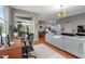 Open-concept living area showcasing living room, dining room, and kitchen at 506 N Mangum St # 303, Durham, NC 27701