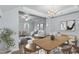 Bright, open living space with modern furnishings, seamlessly connects living and dining areas at 510 Berry Chase Way, Cary, NC 27519