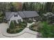 Lovely single story home featuring a winding walkway and a beautiful, professionally landscaped front yard at 515 S Woodland Rd, Henderson, NC 27536