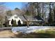Charming home with a manicured front yard and a blend of brick and siding exterior at 515 S Woodland Rd, Henderson, NC 27536