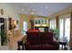 Entertaining game room featuring billiard table, wet bar, and inviting seating area at 515 S Woodland Rd, Henderson, NC 27536