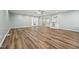 Open floor plan with hardwood floors, natural light, and easy access to the kitchen at 5704 Whippoorwill St, Durham, NC 27704