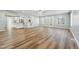 Open floor plan with hardwood floors, natural light, and easy access to the kitchen at 5704 Whippoorwill St, Durham, NC 27704