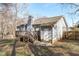 Exterior view of home and backyard with a wooden fence at 5900 Damon Ct, Raleigh, NC 27610