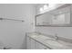 Bathroom with double sinks and framed mirror for convenience and style at 5900 Damon Ct, Raleigh, NC 27610