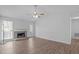 Spacious living area featuring a fireplace and lots of natural light at 5900 Damon Ct, Raleigh, NC 27610