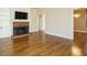 Hardwood floors, recessed lighting, and a fireplace make this living room great for entertaining at 5917 Sentinel Dr, Raleigh, NC 27609