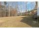 Large backyard view with mature trees and landscaping at 6236 Annabella Rd, Rocky Mount, NC 27803