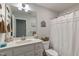 Neat bathroom with ample counter space, white cabinets, and fresh decor at 6236 Annabella Rd, Rocky Mount, NC 27803