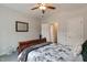 Cozy bedroom showcasing a queen bed and access to an en-suite bathroom at 6236 Annabella Rd, Rocky Mount, NC 27803