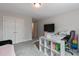 Versatile bedroom space with a modern desk and comfortable lounge area, great for work or relaxation at 6236 Annabella Rd, Rocky Mount, NC 27803