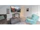 Cozy living room featuring a large screen television and comfortable seating at 6236 Annabella Rd, Rocky Mount, NC 27803