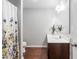 Bathroom features a shower and tub combination and a single sink at 624 Metro Station, Apex, NC 27502