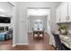 View from the office of the Dining Room. Comfortable home with modern and traditional design elements at 624 Metro Station, Apex, NC 27502
