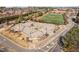 Aerial view of a modern skate park and athletic field in a park, perfect for recreation and outdoor activities at 624 Metro Station, Apex, NC 27502