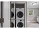Convenient laundry closet with stacked washer and dryer unit for efficient space-saving at 700 Ross Rd, Lillington, NC 27546