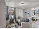 Comfortable living room with neutral decor, providing a versatile space for relaxation and entertainment at 700 Ross Rd, Lillington, NC 27546