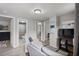 Open-concept living room with views into bathroom and bedroom, ideal for modern living and entertaining at 700 Ross Rd, Lillington, NC 27546