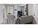 Spacious living room with modern decor and seamless flow to the kitchen, creating an ideal space for relaxation at 700 Ross Rd, Lillington, NC 27546
