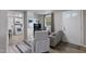 Bright and airy living room with seamless transition to the kitchen, creating an ideal space for entertaining guests at 700 Ross Rd, Lillington, NC 27546