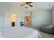 Bright bedroom with blue walls, light carpeting and a large bed at 708 Barley Green St, Wake Forest, NC 27587