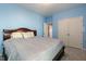 Bedroom featuring a large bed and double closets at 708 Barley Green St, Wake Forest, NC 27587