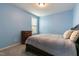Comfortable bedroom with a window and dresser at 708 Barley Green St, Wake Forest, NC 27587