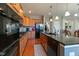 Modern kitchen with stainless steel appliances and granite countertops at 708 Barley Green St, Wake Forest, NC 27587