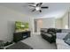 Upstairs living room with a television, plush seating, neutral walls and soft carpeting at 708 Barley Green St, Wake Forest, NC 27587