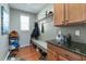 Convenient mudroom featuring storage cabinets, a bench, and coat hooks at 708 Barley Green St, Wake Forest, NC 27587