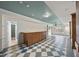 Finished basement with unique checkered flooring, a bar area, and recessed lighting at 8720 Deerland Grove Dr, Raleigh, NC 27615