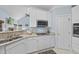 Kitchen with stainless steel appliances, granite countertops, and white cabinetry at 8720 Deerland Grove Dr, Raleigh, NC 27615