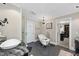 Elegant bathroom with a clawfoot tub, walk-in shower, and stylish fixtures at 920 W Johnson St, Raleigh, NC 27605