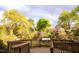 Scenic community trail featuring natural beauty with mature trees and a wooden overlook with informational signage at 920 W Johnson St, Raleigh, NC 27605