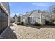 Back of house featuring brick patio and access to the backyard at 920 W Johnson St, Raleigh, NC 27605